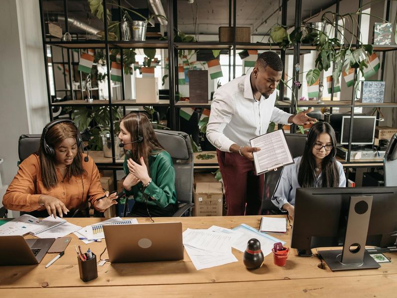 Customer support team responding to tech inquiries via multiple channels